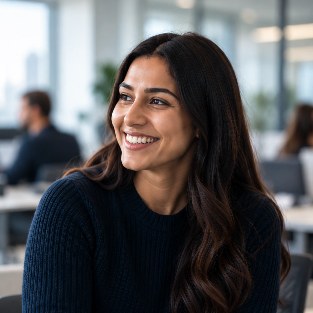 Smiling 800 Orders team member in the office